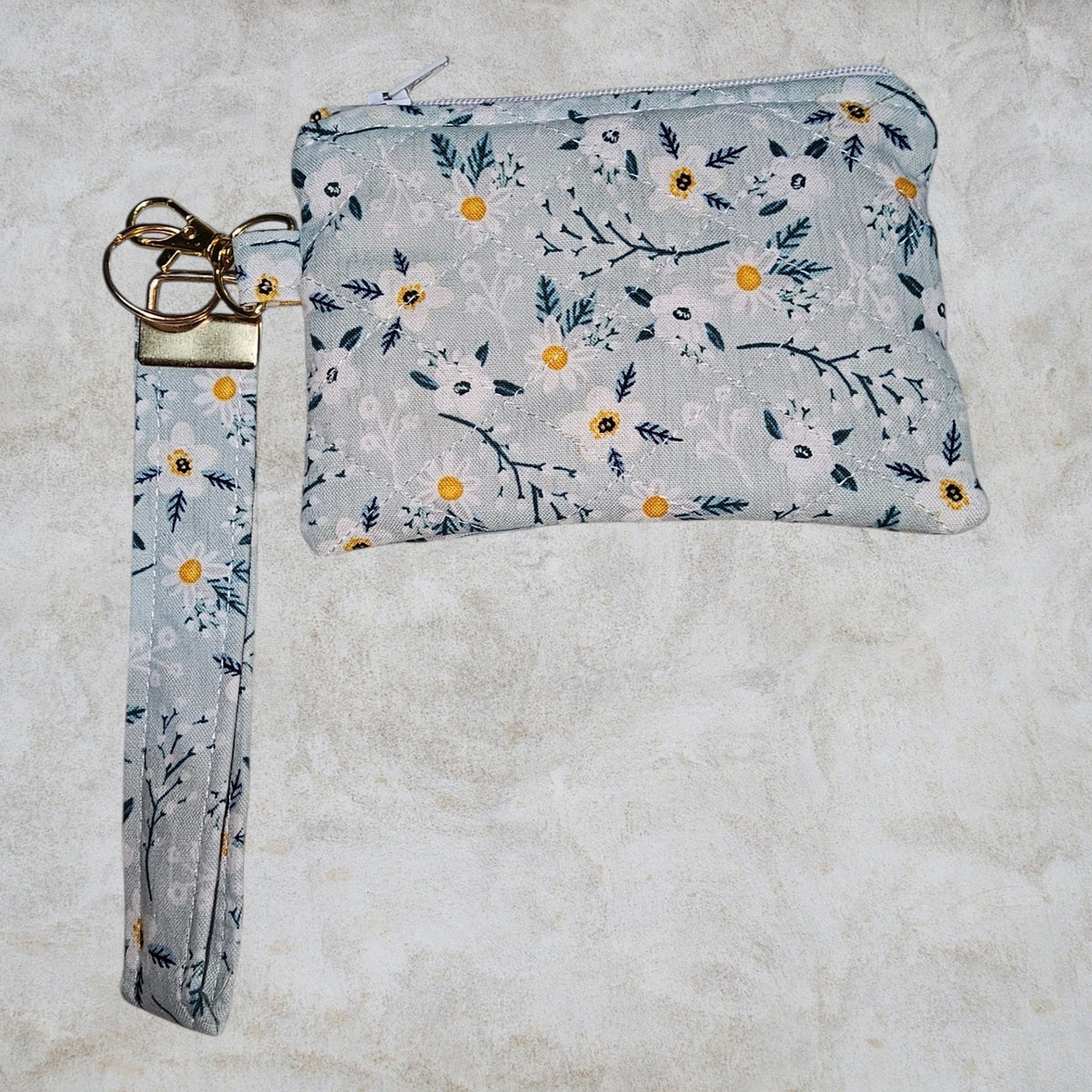 Green and white floral quilted Zipper wristlet wallet