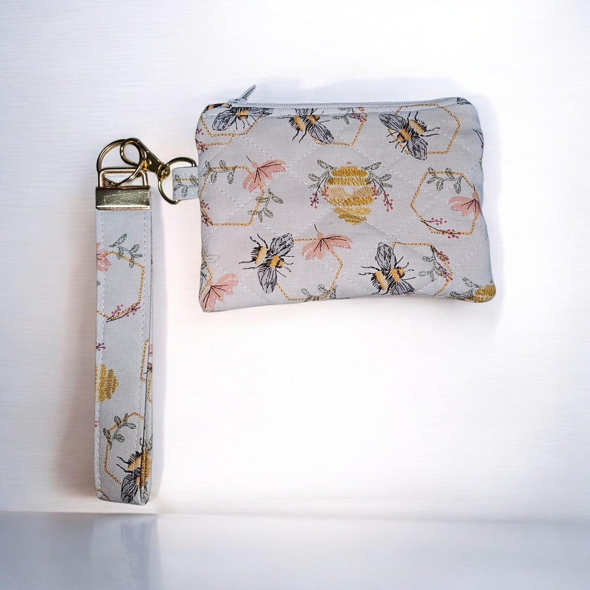 Honeybee Quilted zipper wallet with wristlet.