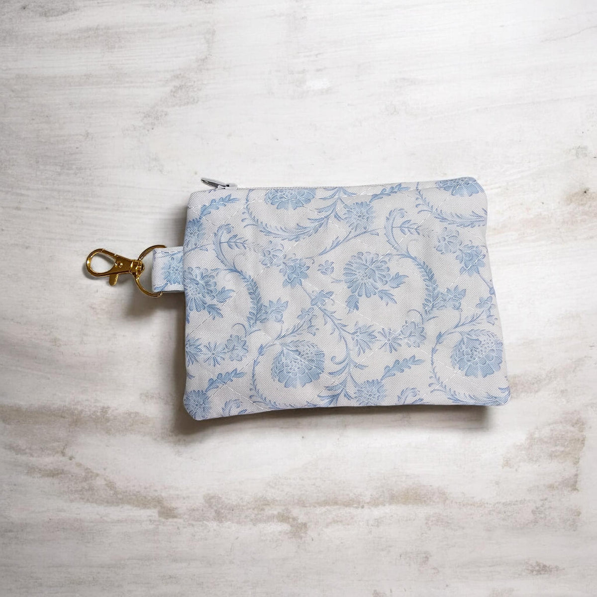 Light Blue scroll print wristlet and quilted zipper wallet