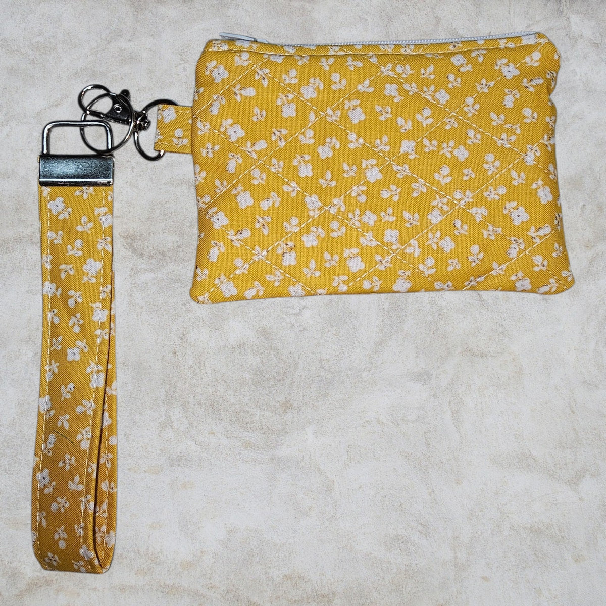 Yellow flower quilted wristlet wallet